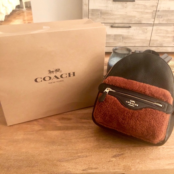 Coach Handbags - Coach mini Charlie shearling backpack NWT